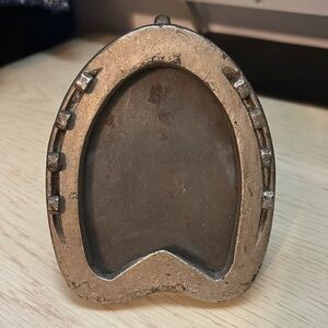 Antique horseshoe picture frame